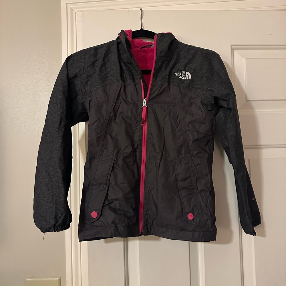 The Northface girls rain jacket lined in fleece. This is a great jacket in EUC.